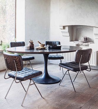 table ronde avec plateau en pierre bleue style contemporain